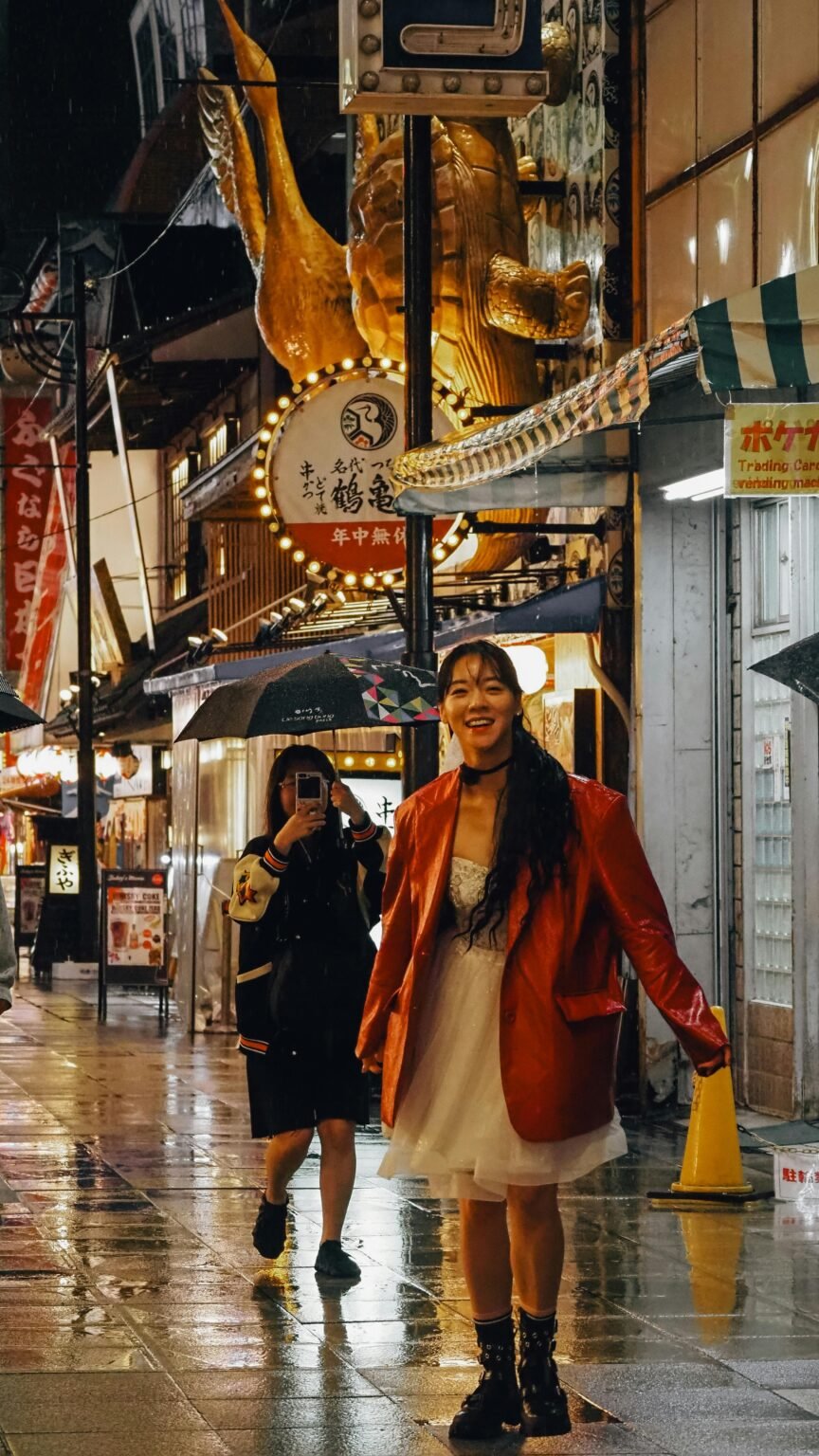 Traveller exploring a lively street food market at night