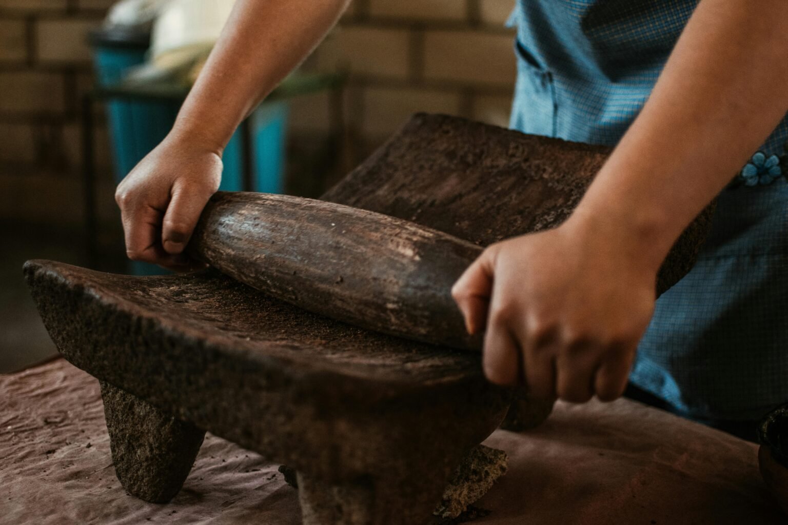 Cook preparing a traditional dish