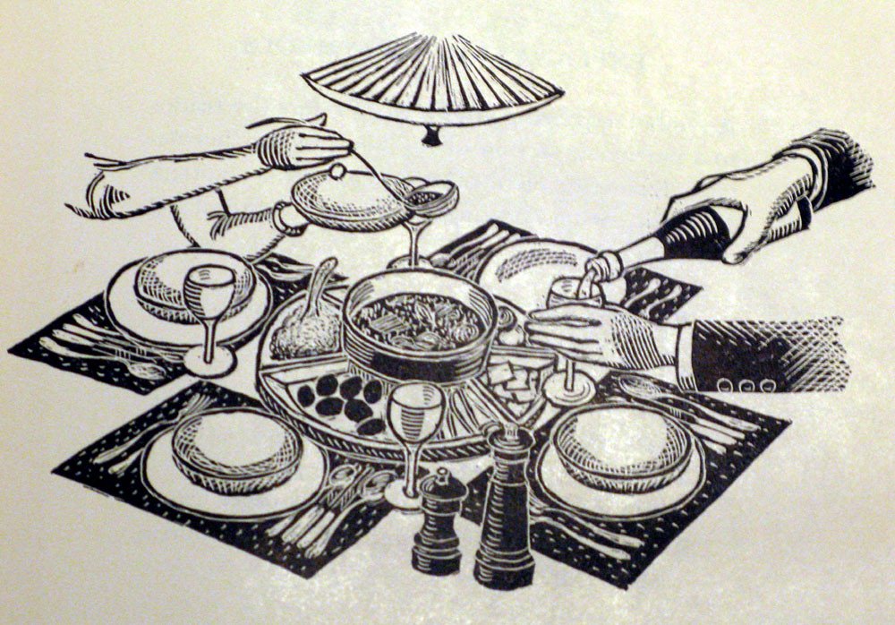 Libro de cocina abierto sobre una encimera